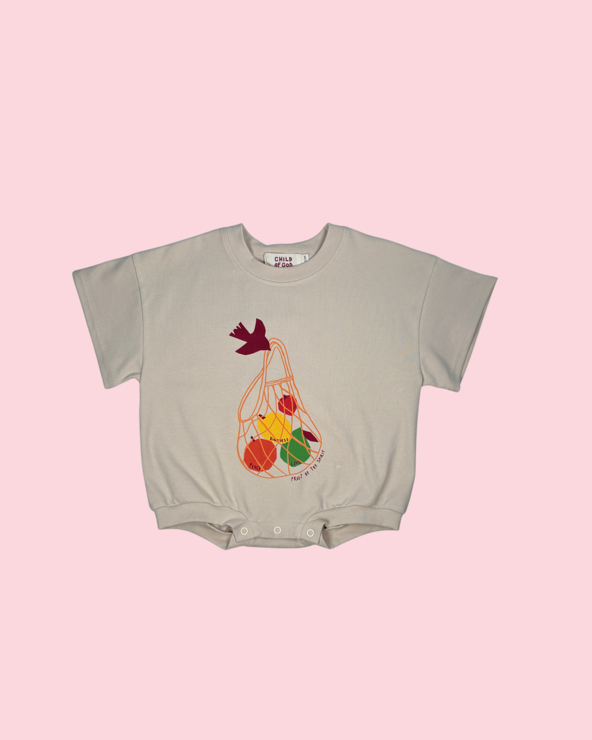 Beige baby romper with a colorful fruit design on a white background